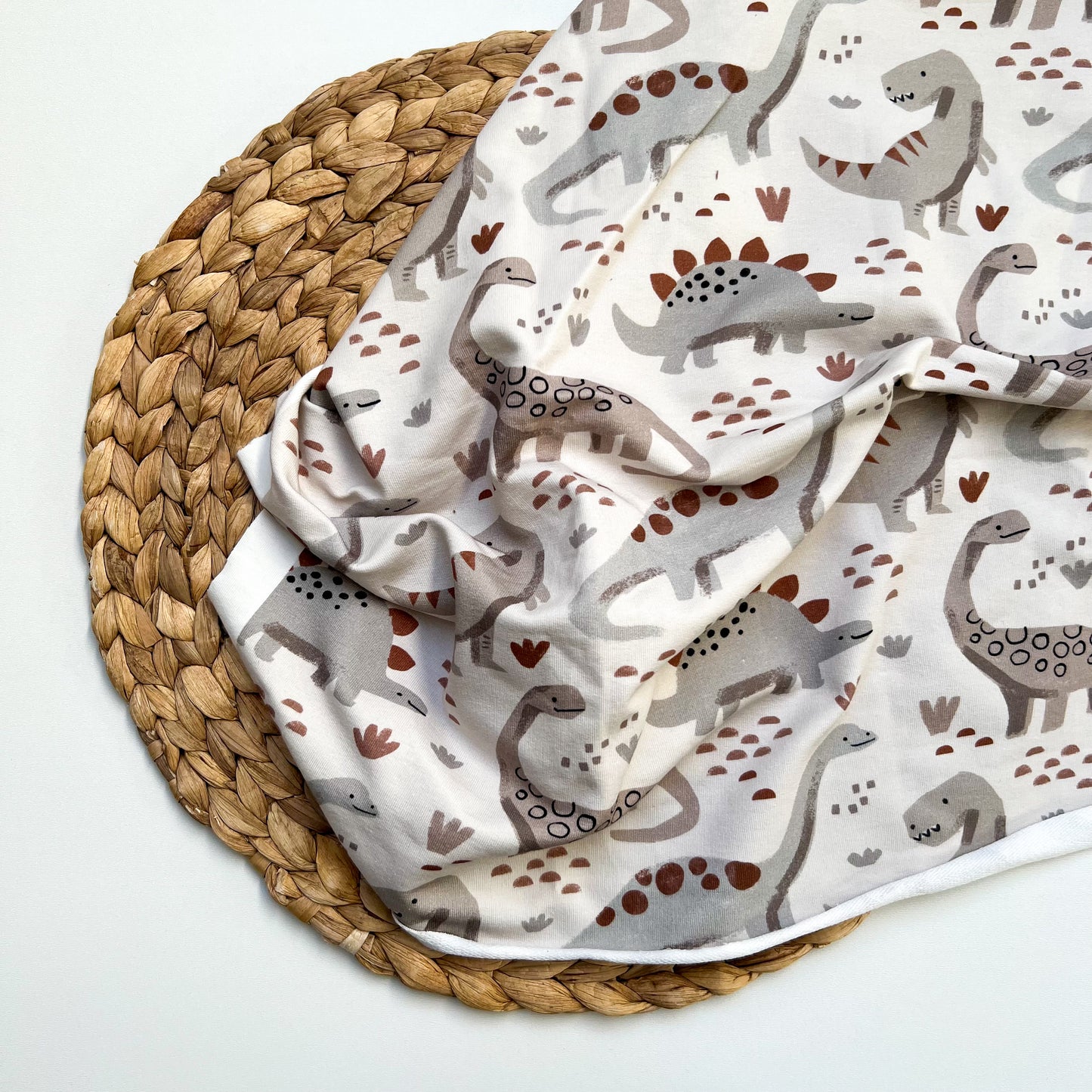 French Terry Dinos grau / beige / rost